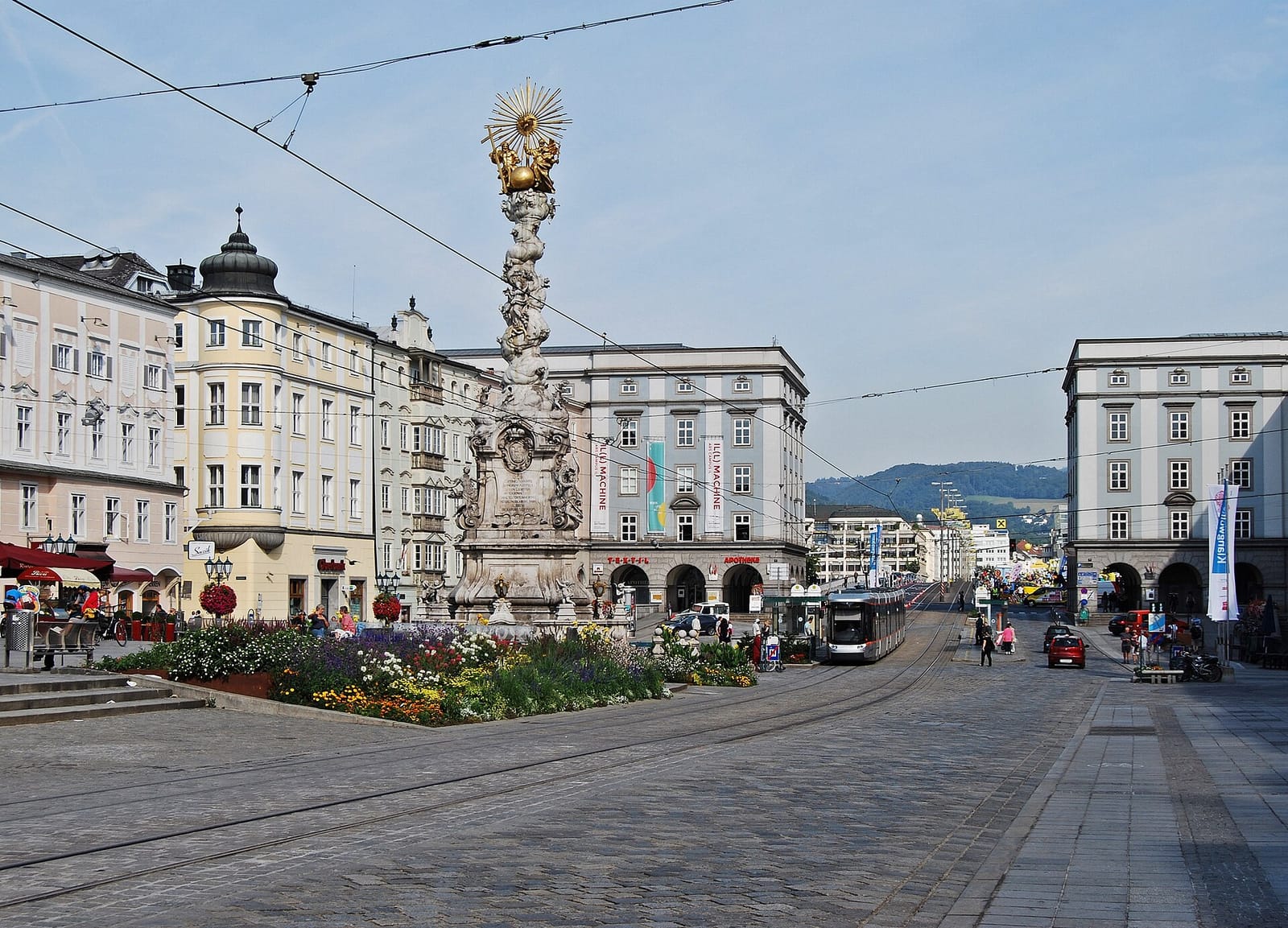 Linz main square and the Danube with Pöstlingberg above