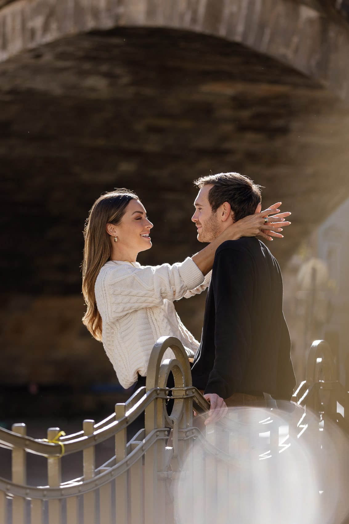 Candid engagement portrait in Prague